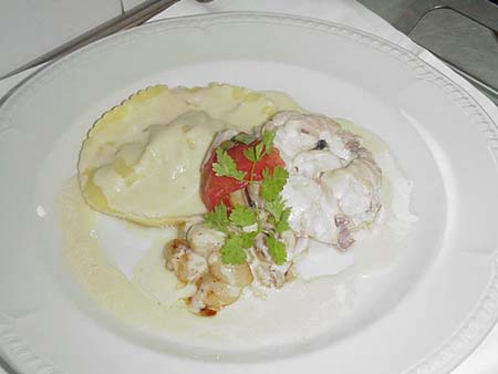 Merlu pochè aux coquillages